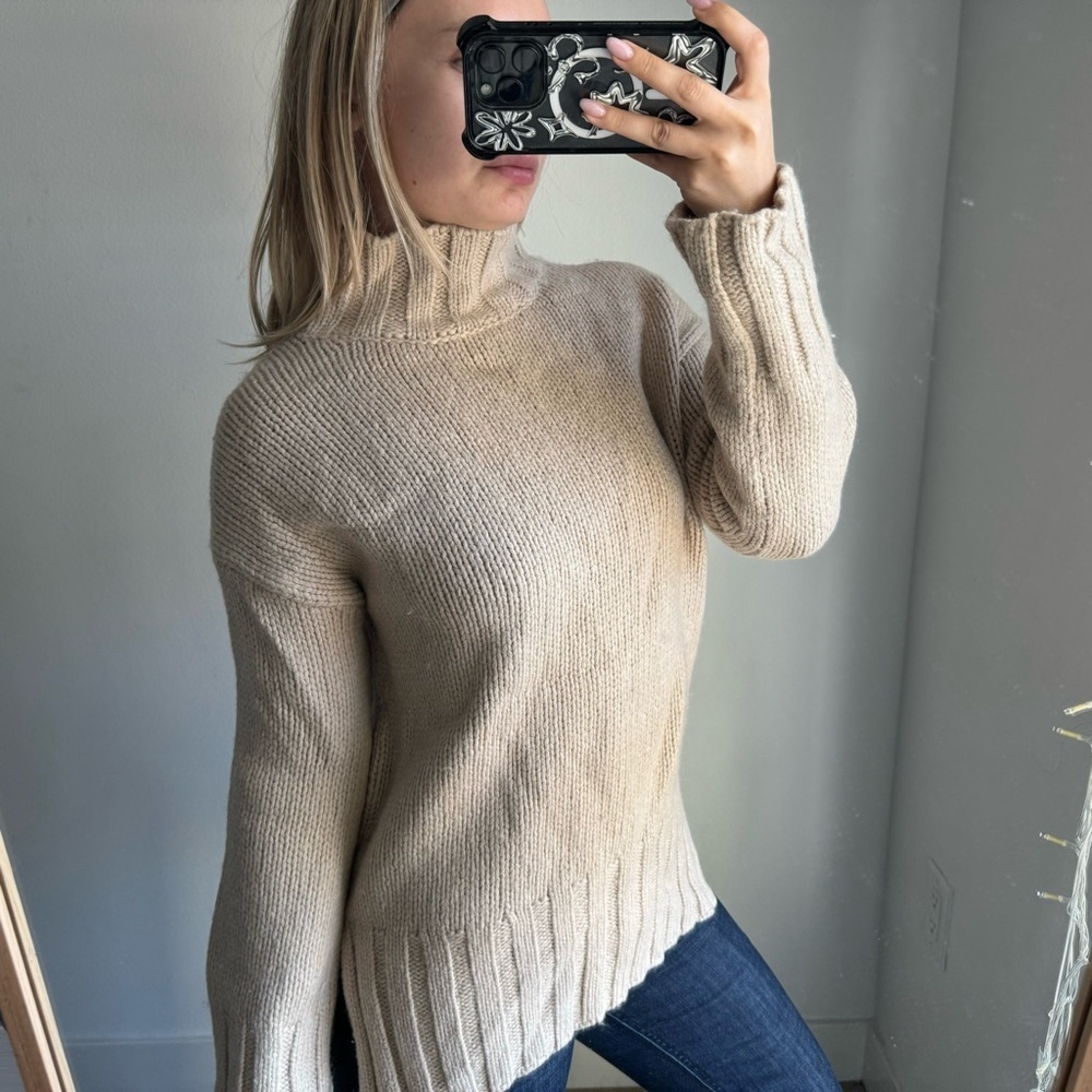 The white company Cream turtleneck sweater with a relaxed fit